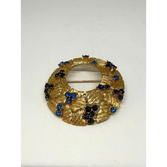 Vintage Unsigned Gold Tone Blue Rhinestone Round Brooch - Picture 2 of 6
